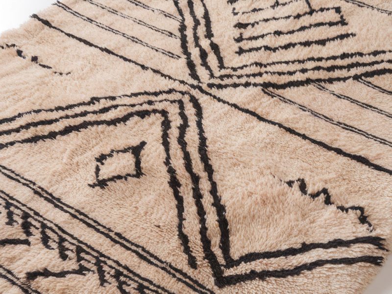 a-photo-of-a-berber-rug-with-a-tribal-pa